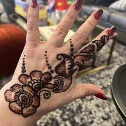 Malti's Mehndi - Completed. Once dried and you wash your hands it turns a dark red colour.