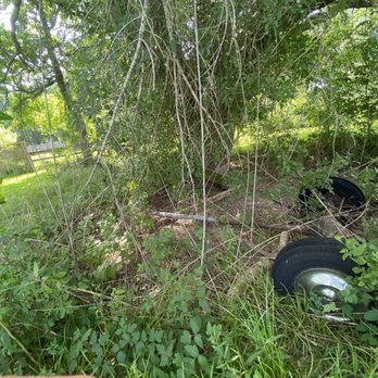 Clear Your Junk - Old metal and wood pieces laying around the yard he cleared out. - Junk Removal & Hauling Near Me