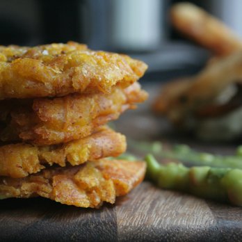 Om Sabor - Patacones: Crispy Green Plantain Chips with Avocado Sauce - Caterers Near Me