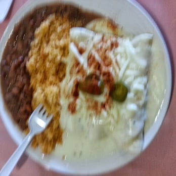 Rose Cafe - Sour Cream chicken enchiladas with Mexican rice and beans! - Cheesesteaks Near Me - Dallas, Texas Rose Cafe - Sour Cream chicken enchiladas with Mexican rice and beans! - Cheesesteaks Near Me - Dallas, Texas