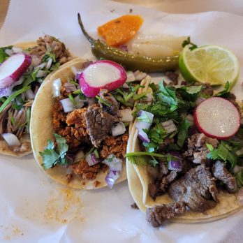 Los Chilangos - 3 tacos, one with carnitas, one with carne asada, one with chupacabra - Mexican Near Me - Bellevue, Washington Los Chilangos - 3 tacos, one with carnitas, one with carne asada, one with chupacabra - Mexican Near Me - Bellevue, Washington