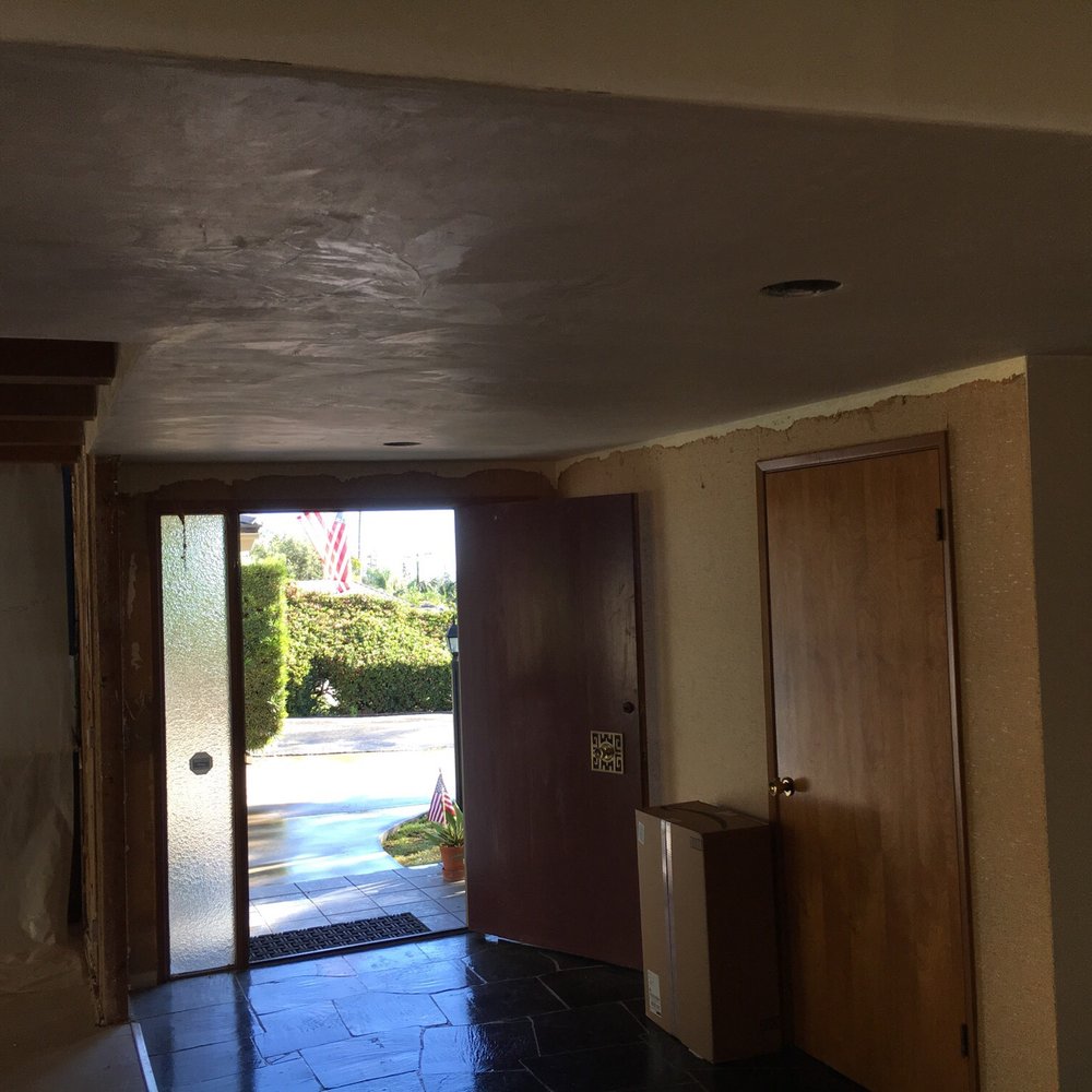 Patchwork's Plastering  & Patching Specialists - Entry Way after (before paint) - Stucco Services Near Me