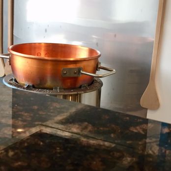Harbor House Sweets - a copper pot on a stand - Desserts Near Me - Washburn, Wisconsin Harbor House Sweets - a copper pot on a stand - Desserts Near Me - Washburn, Wisconsin