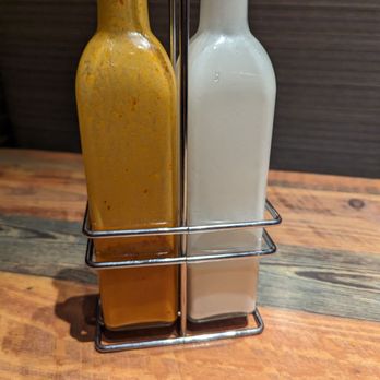 Tribos Peri Peri Chicken - two bottles of mustard - Halal Near Me - Westborough, Massachusetts Tribos Peri Peri Chicken - two bottles of mustard - Halal Near Me - Westborough, Massachusetts