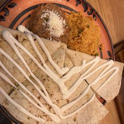 Cinco Ninos - Pork carnitas quesadilla with rice and beans