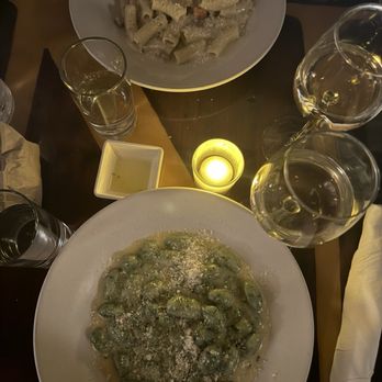 Giano Restaurant - Rigatoni with sausage in a creamy truffle sauce Gnocchi ai 4 Formaggi - Italian Near Me - New York, New York