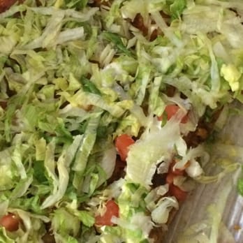 Sparky's Pizzeria - a pizza with lettuce and tomatoes - Pizza Near Me - Urbana, Ohio Sparky's Pizzeria - a pizza with lettuce and tomatoes - Pizza Near Me - Urbana, Ohio