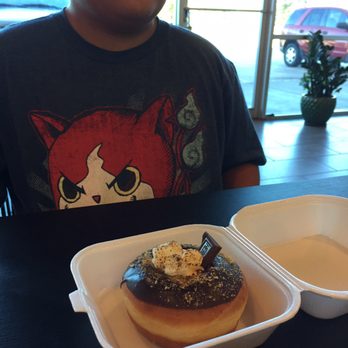 Donut Guys - Super scrumptious s'mores donut! Luckily my son loves me and shared a bite. - Donuts Near Me - Houston, Texas