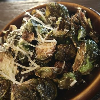 Orange County Mining Company - Brussels Sprouts. Crispy charred edges with Parmesan sprinkled on top was perfection. - Steakhouses Near Me - Orange, California Orange County Mining Company - Brussels Sprouts. Crispy charred edges with Parmesan sprinkled on top was perfection. - Steakhouses Near Me - Orange, California