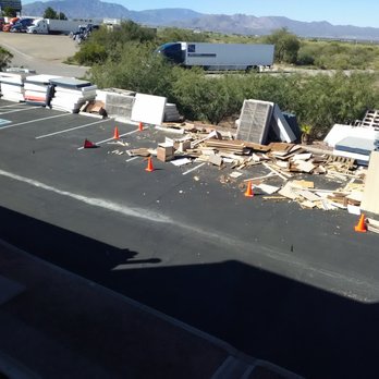 Motel 6 - View from my only window. Nice they're bringing out old & in with the new, but, it's odd rubbish is dumped onto a bunch on parking spaces. - Hotels Near Me - Benson, Arizona