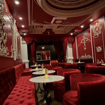 Midnight & The Wicked - a red room with red couches - Lounges Near Me - Philadelphia, Pennsylvania Midnight & The Wicked - a red room with red couches - Lounges Near Me - Philadelphia, Pennsylvania