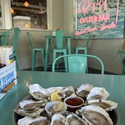Shucker's Oyster Bar - Dozen oysters. Market price and ended up only being $22!