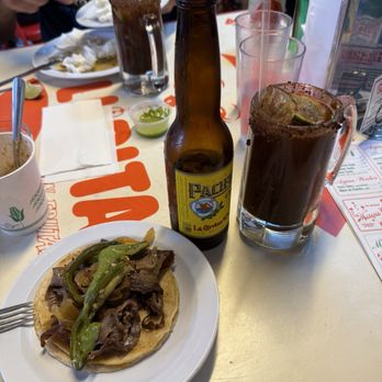 Tacombi - Michelada and a Ribeye Deluxe Taco. - Tacos Near Me - Chicago, Illinois Tacombi - Michelada and a Ribeye Deluxe Taco. - Tacos Near Me - Chicago, Illinois