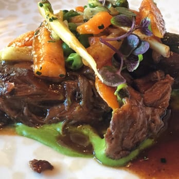 NoMI - Cabernet Sauvignon Braised veal cheek. Green pea cream, toasted parsnip, baby carrots - Bars Near Me - Chicago, Illinois NoMI - Cabernet Sauvignon Braised veal cheek. Green pea cream, toasted parsnip, baby carrots - Bars Near Me - Chicago, Illinois