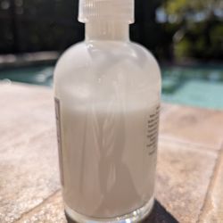 K Hall Studio - Took this picture outside in the light to show the level of the lotion. A little over half full.