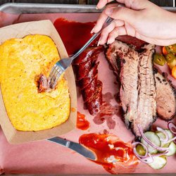 Locals Know Barbecue Tours - Cheesy jalapeno grits, juicy sausage, and smoked brisket.