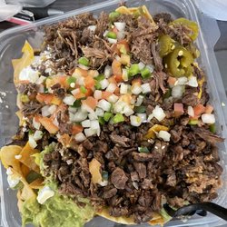 Pollo Regio - Loaded Nachos with steak beef and barbacoa