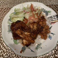 The Boss Dominican Restaurant - White rice, beans and chicken in creole sauce with salad.  Arroz blanco, habichuelas y pollo guisado con ensalada.