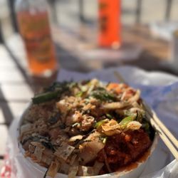 Large poke bowl, salmon, 2x tuna, scallops, and yellow tail, ginger shoyu, grilled onions, garlic flakes, wonton chips