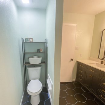 TCB Remodeling & Construction - a bathroom before and after - Electricians Near Me