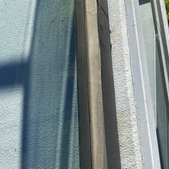 Ortiz Glass - Base shoe cover with lack of marine grade paint. Even worse caulking job. - Windows Installation Near Me - Los Angeles, California