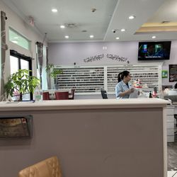 Envy Nails and Spa - Wall full of nail polish