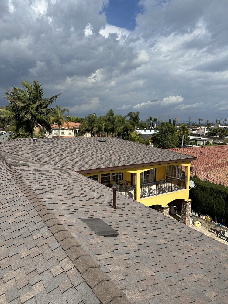 Slide of Alex's Top Roofing