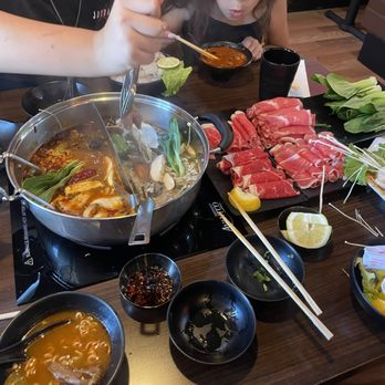 Sichuan Hot Pot - One side of our soup was Sichuan Spicy Beef Broth and the other was Shiitake Mushroom Broth. - Hot Pot Near Me - Fresno, California Sichuan Hot Pot - One side of our soup was Sichuan Spicy Beef Broth and the other was Shiitake Mushroom Broth. - Hot Pot Near Me - Fresno, California