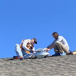 Elite Insulation and Solar - Todd and Paul installing a solar attic fan.