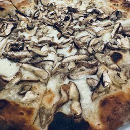 Mushroom and truffle pizza. Traditional crust. Mushroom and truffle pizza. Traditional crust.