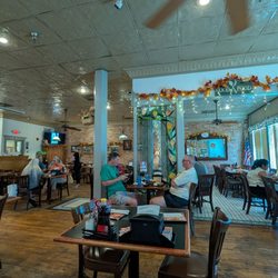 D's Breakfast & Burgers - Old pressed tin style ceiling tiles, room within a room looks cosy.