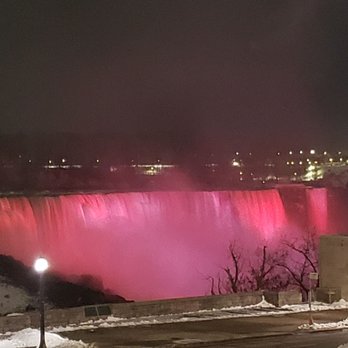 Sheraton Fallsview Hotel - One of the changing colors of the falls - Hotels Near Me - Niagara Falls, Ontario Sheraton Fallsview Hotel - One of the changing colors of the falls - Hotels Near Me - Niagara Falls, Ontario