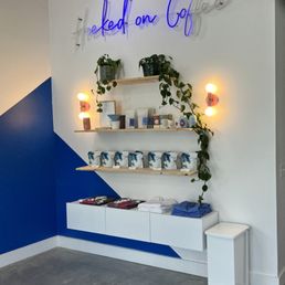 a coffee shop with a blue wall a coffee shop with a blue wall