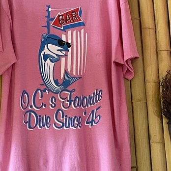 The Bar - a pink t - shirt hanging on a bamboo wall - Dive Bars Near Me - Ocean City, Maryland The Bar - a pink t - shirt hanging on a bamboo wall - Dive Bars Near Me - Ocean City, Maryland