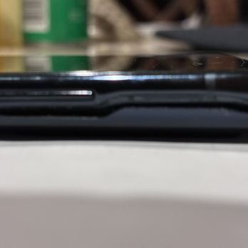 249 Wireless &  Computers - phone on side - large gap visible - Electronics Repair Near Me - Houston, Texas