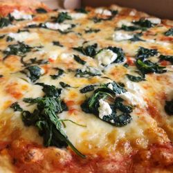 Jojo's Tavern - The best pizza, hands down!! White pizza with a splash of sauce, spinich, mozzarella, ricotta, and garlic!! Perfect!!!