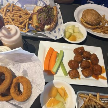 Burgers & Beer - Half order onion rings, boneless buffalo wings, kids cheeseburger with beer battered fries - American Near Me - Rancho Mirage, California Burgers & Beer - Half order onion rings, boneless buffalo wings, kids cheeseburger with beer battered fries - American Near Me - Rancho Mirage, California