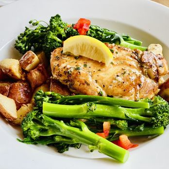 yum! Kitchen and Bakery - Lemon chicken with broccolini and roasted potatoes - Bakeries Near Me - Saint Paul, Minnesota yum! Kitchen and Bakery - Lemon chicken with broccolini and roasted potatoes - Bakeries Near Me - Saint Paul, Minnesota