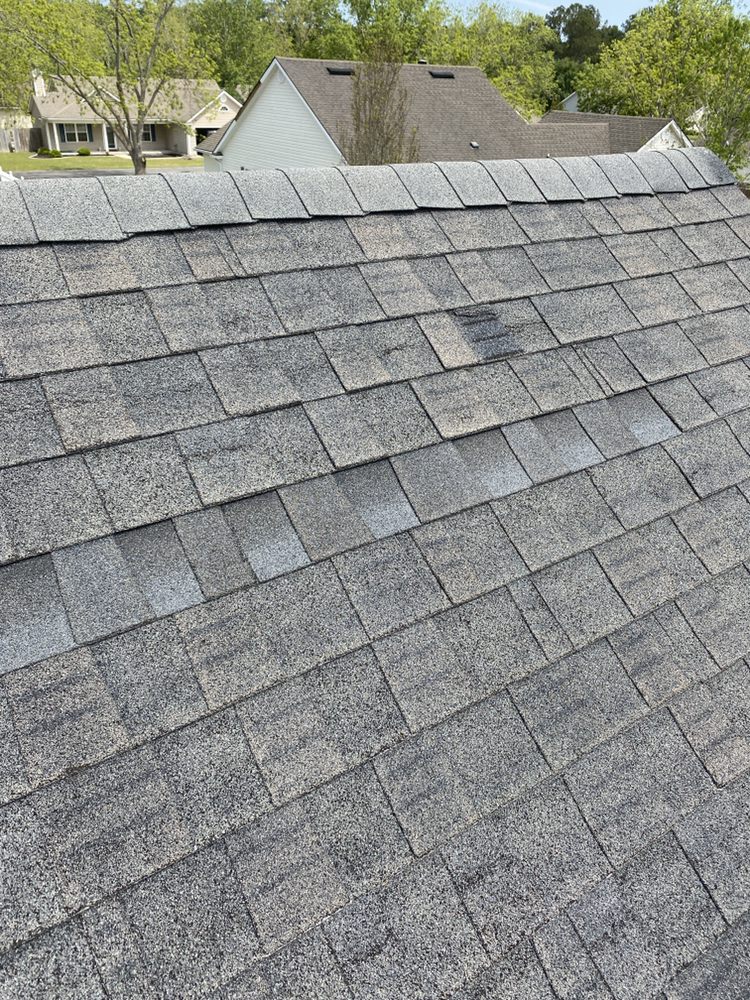 Slide of On Point Roofing