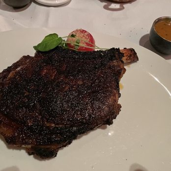 T-Bones - Bone-In Ribeye With Garlic Cilantro Butter - Steakhouses Near Me - Las Vegas, Nevada T-Bones - Bone-In Ribeye With Garlic Cilantro Butter - Steakhouses Near Me - Las Vegas, Nevada