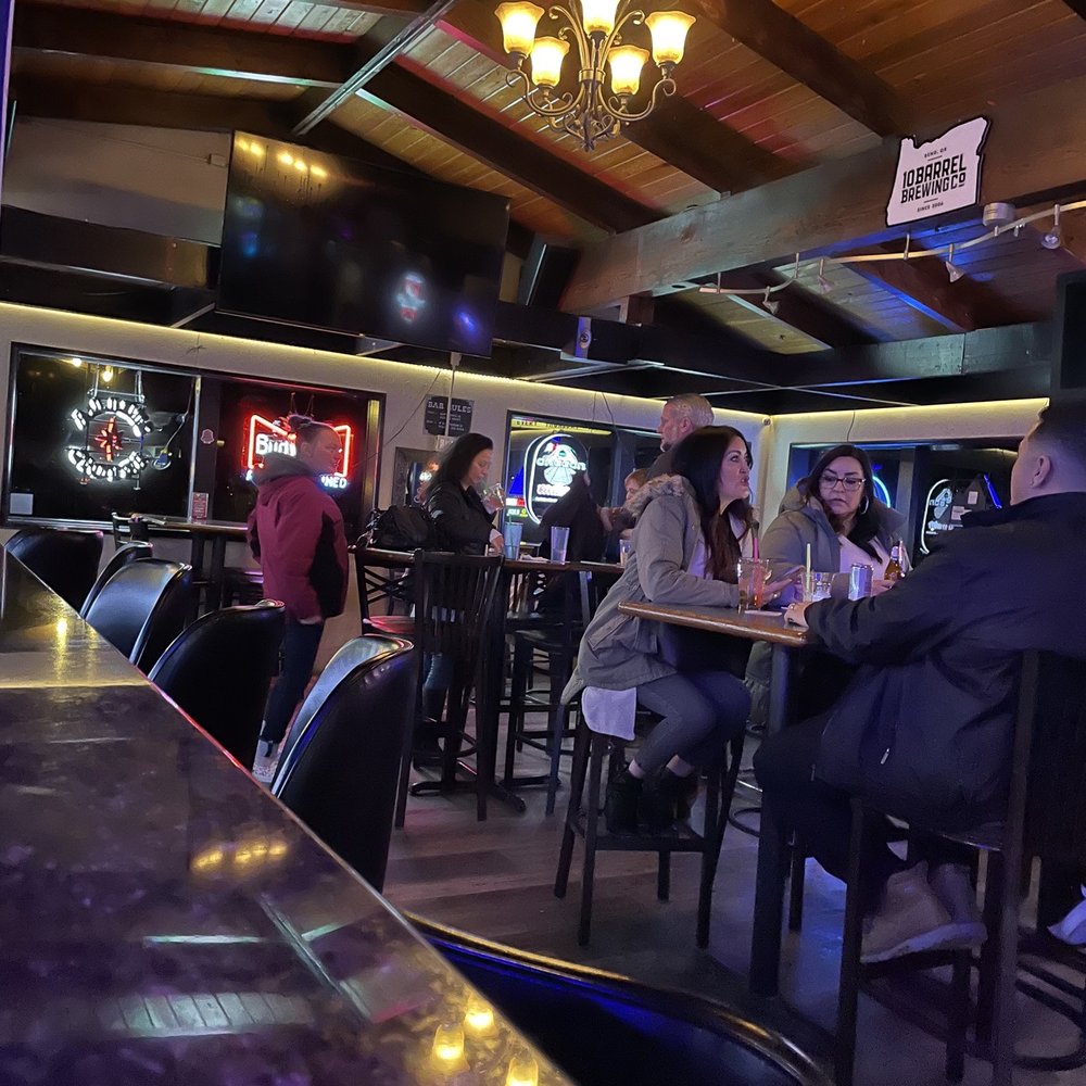 people sitting at the bar people sitting at the bar