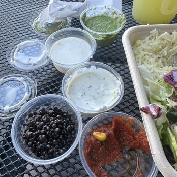 CAVA - From top: skchug (3rd best), garlic aioli (2nd best),tzatziki (meh) ,lentils (dry),harrisa (best) - Salad Near Me - El Segundo, California