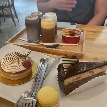 Cake Bar - The Cafe - - Coffee flight with lemon tart, crème Brûlée, and chocolate cake - Custom Cakes Near Me - Syracuse, New York
