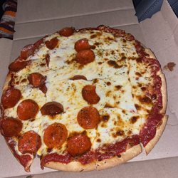 Rocco's Pizza - Half Thin Crust Cheese Pizza with 1/2 pepperoni. I love this pizza!