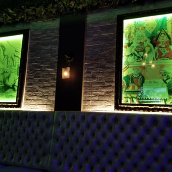 Rabbit Hole - Some of the artwork on the walls - Lounges Near Me - Alhambra, California