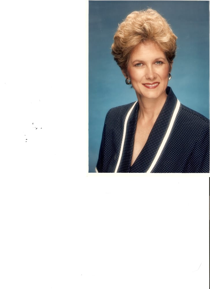 Marci R Coffey, RE Logo