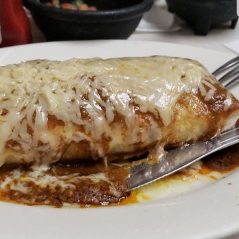 La Langosta Restaurant - This is the burrito de pollo (mojado). Contains chicken, beans, rice, and vegetables. Cheese and enchilada sauce on the outside. - Mexican Near Me - Dinuba, California La Langosta Restaurant - This is the burrito de pollo (mojado). Contains chicken, beans, rice, and vegetables. Cheese and enchilada sauce on the outside. - Mexican Near Me - Dinuba, California