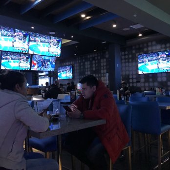 Dave & Buster's Springfield - No one helping us at our table. The waiters are lined up at the bar ignoring us after we went up three times to get service. - American Near Me - Springfield, Virginia