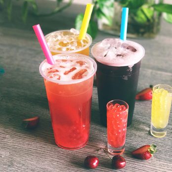 Addictea Cafe - a variety of drinks on a table - Bubble Tea Near Me - Houston, Texas