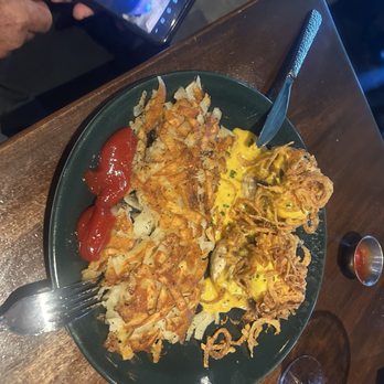 Reunion Kitchen + Drink - Pork with biscuits and hollandaise sauce poached eggs and well done hashbrowns - New American Near Me - Corona, California Reunion Kitchen + Drink - Pork with biscuits and hollandaise sauce poached eggs and well done hashbrowns - New American Near Me - Corona, California